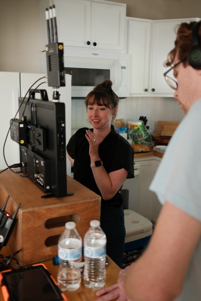 Bridgette Jensen directing on-set video production