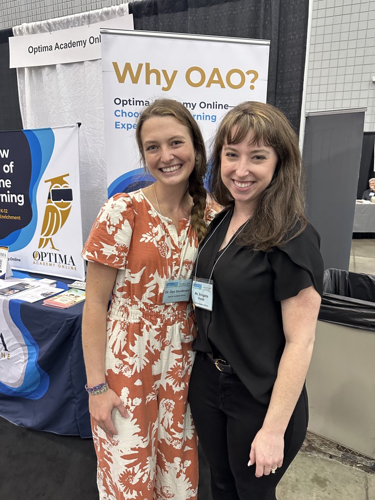 Bridgette Jensen with a colleague at the Optima Academy Online booth